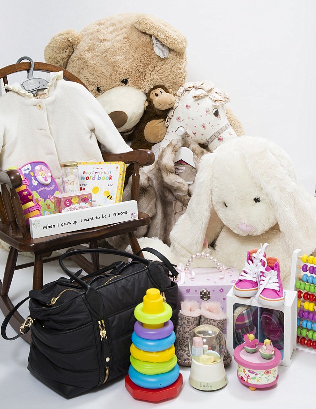 Some of the gifts from the baby shower including a Burberry Changing Bag