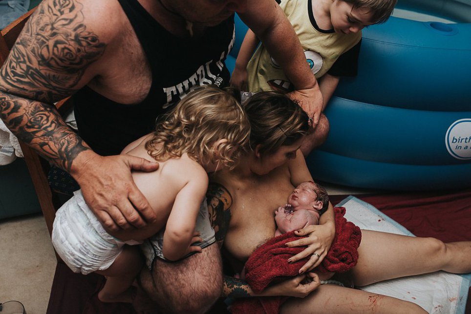 EXCLUSIVE Birth photographer captures intimate cord burning cere